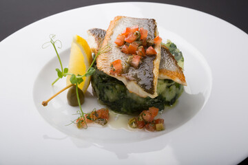 Fried fish fillet with spinach