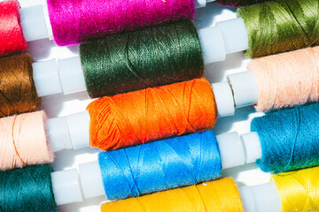 Texture from rows of multicolored coils of thread