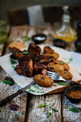pork ribs with potatoes.selective focus.style rustic.