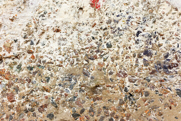 Background concrete wall, traces of weathering, worn wall damaged paint old paint. Remains of old paint on the painted concrete surface. Grungy concrete surface.