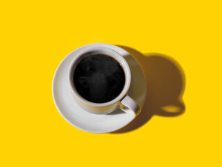Hot strong black coffee in white elegant cup with saucer over a bright yellow background. Hot morning beverage. Shot with hard light.