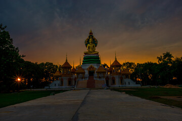 background of one of the beautiful religious attractions in the Ubon Ratchathani Province of Thailand (Wat Mongkol Kowitharam) has beautiful sculptures and is worth preserving for future generations t