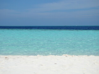 MALDIVES, BLUE SEA AND BEACH