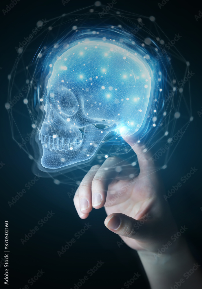 Aufkleber Man hand using digital x-ray skull holographic scan projection 3D rendering
