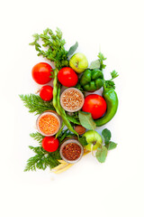 different vegetables and fruits on a white isolated background.
