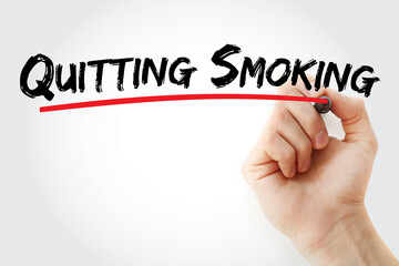 Quitting smoking text with marker, health concept background