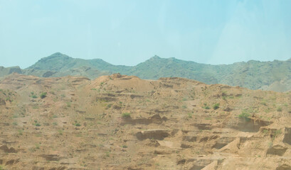 Landscape image of brown mountains