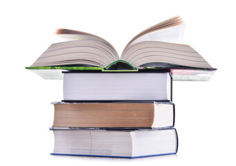 Composition with stack of books isolated on white