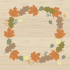Square frame of autumn leaves and branches of various trees on a wooden surface. Autumn background design for your text, illustration for postcards and invitations.