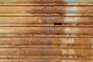 Rusted through metal fencing. Abstract old background or texture.