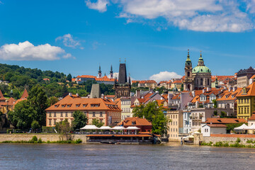 Fototapeta premium A view of old Prague from the Vltava river on a lovely lazy afternoon