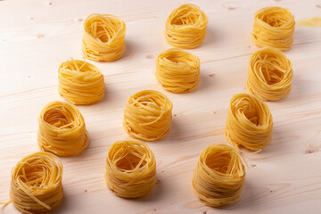 italian dry pasta on wooden surface