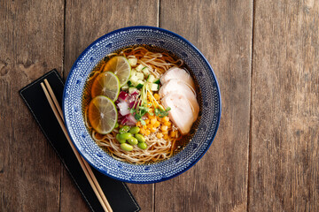 Summer cold ramen noodle soup with chicken