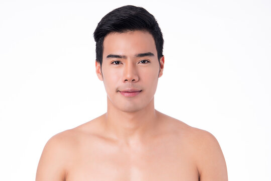 Close up portrait of handsome young asian man on white background,