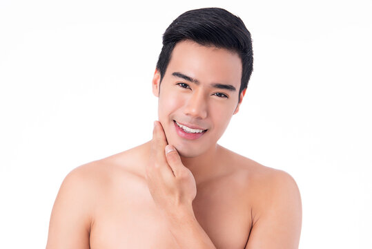 Close up portrait of handsome young asian man on white background,