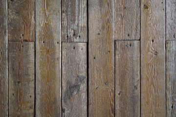 Old brown wooden wall background texture close up