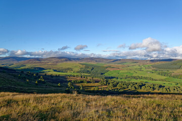 The small shallow Valley of Glen Prosen seen from the Moorland Summit of Tulloch Hill on a sunny...