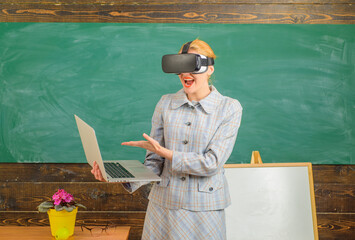 E-learning. Online Study. School. Teacher in vr glasses. Education concept. School. Portrait of sensual female teacher in suit. Business concept.