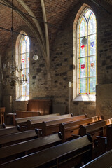 Interior with pews and windows of the reformed Stiftskerk or Stiftschurch in Weerselo, Dinkelland in the Netherlands