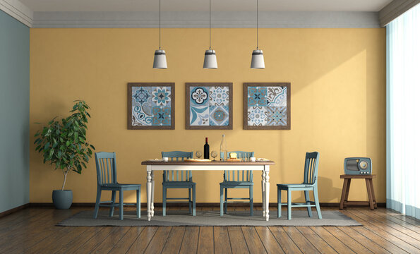 Vintage style dining room with blue chairs and table