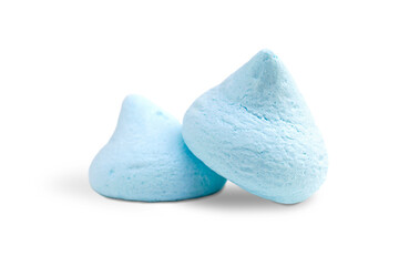 Two fresh meringues of gentle blue color on a white background. Sweet fluffy candies made with eggs...