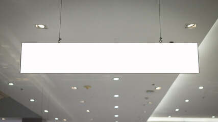 mock up and blank white screen billboard for advertising or information hanging in the supermarket