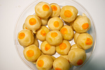Thai sweets with yellow beans inside