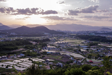 Beautiful landscape panoramic view of county side background curious clouds.