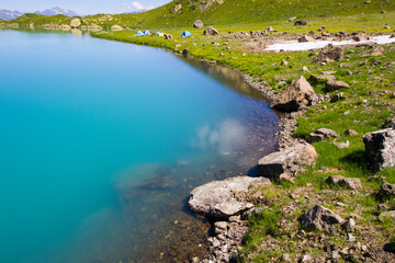 Alpine mountain lake landscape and view, blue beautiful and amazing lake panorama