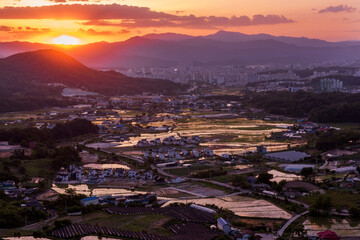 Beautiful landscape panoramic view of county side background curious clouds.