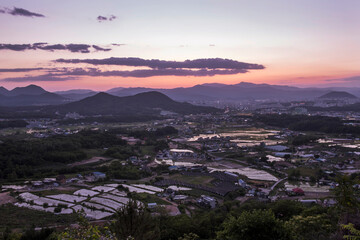Beautiful landscape panoramic view of county side background curious clouds.