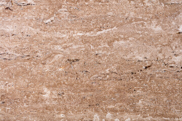 Unique natural travertine background in beautiful brown tone.