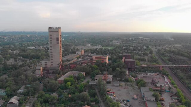 Industrial mining conveyor red iron ore aerial drone right camera movement Krivoy Rog Ukraine