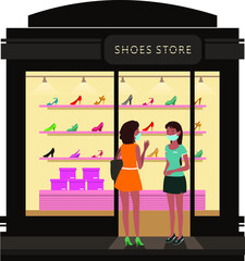 A woman talking to the sales woman at shoes store