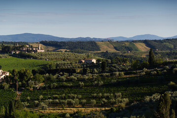 Evening lights on the Tuscan landscape, view from the town of San Gimignano