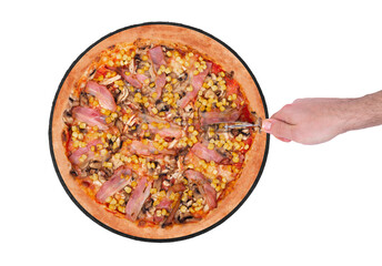 The chef cuts the pizza with a pizza cutter. Tasty pizza with chicken breast, corn, bacon and mushrooms, on a slate black plate, isolated on white background