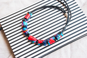 Abstract colorful tube necklace. Handmade jewelry design.
