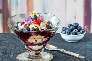 Ice cream dessert with blueberry and cardamom compote
