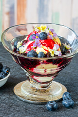 Ice cream dessert with blueberry and cardamom compote