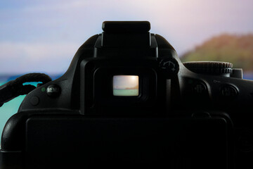 Behind the scenes of nature photography with the viewfinder shooting with a DSLR camera. © BOLEO