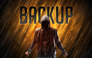 Mysterious man with BACKUP inscription, online security concept