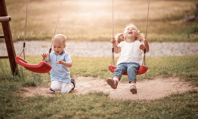 Boy and boy playing on the backyard