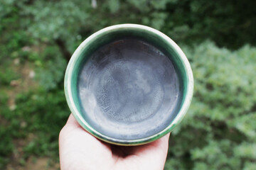 pebbled glaze assembly at the bottom of the ceramic plate. spectacular glaze with the addition of several metal salts. handmade. wrinkles are like the growth of germs in a petri dish