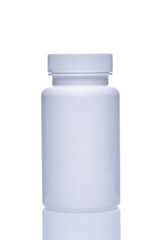 White plastic jar packaging for pills on a white background.