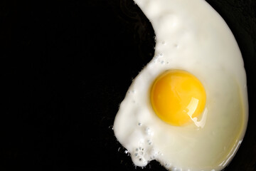 scrambled eggs in a pan copy space close-up