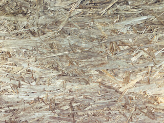 Pressed wood background, chipboard texture closeup