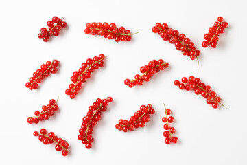 Red currant berries isolated on a white background