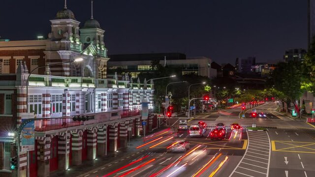 Street traffic near the fire station of Singapore day to night transition aerial timelapse. The Central Fire Station is the oldest existing fire station in Singapore on Hill street