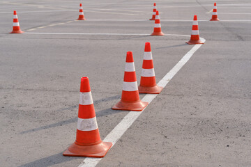Site with cones at a driving test school for obtaining a car license