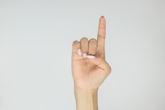 Finger Spelling The Alphabet In American Sign Language (ASL). The Letter D